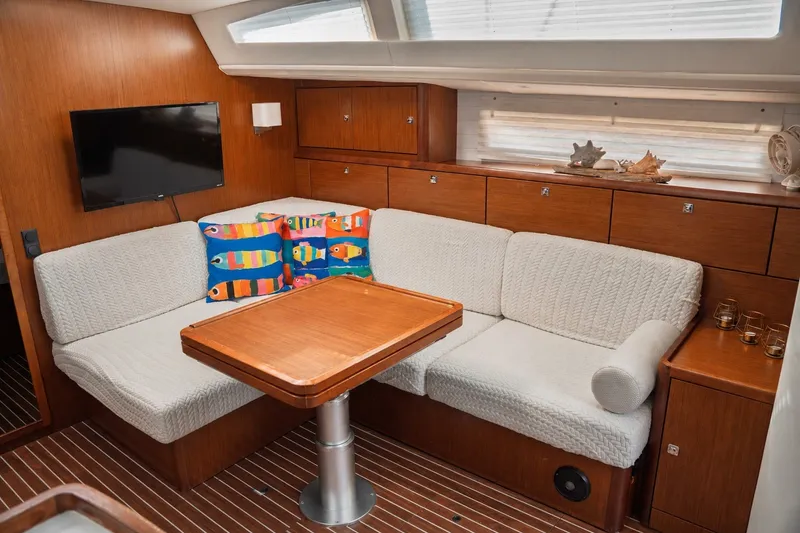 Slide: The Image of Interior of 2015 Bavaria Vision 46 yacht with cozy seating and colorful cushions. - 19