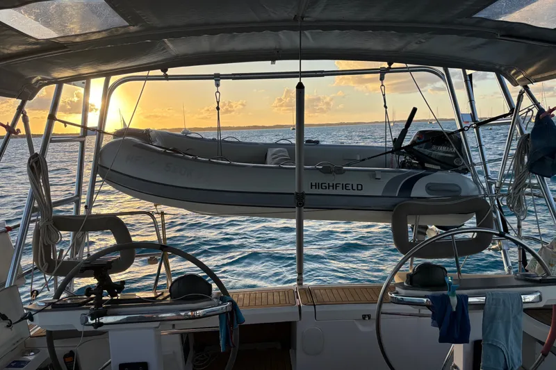 Slide: The Image of Sailing yacht Bavaria Vision 46 cockpit with dinghy at sunset, 2015 model. - 16