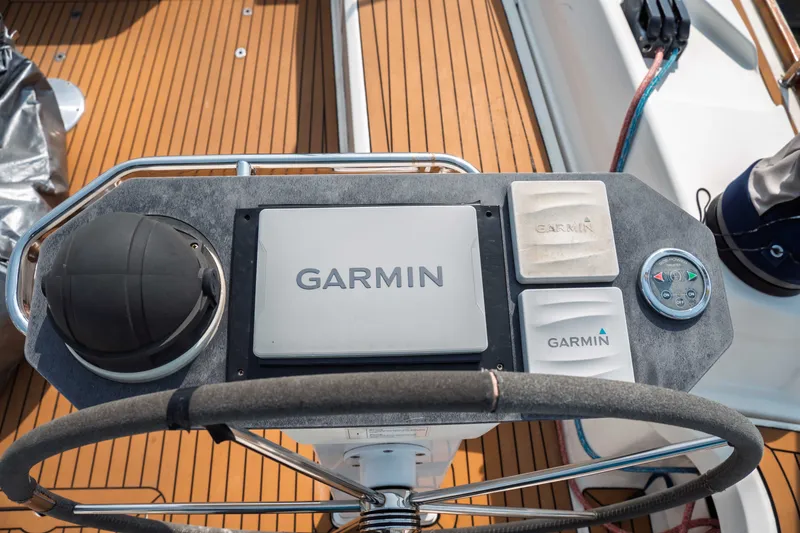 Slide: The Image of Steering wheel and Garmin navigation system on 2015 Bavaria Vision 46 yacht. - 15