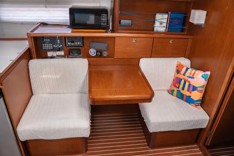 Slide: The Image of Interior of 2015 Bavaria Vision 46 yacht with cozy seating and colorful decor. - 23