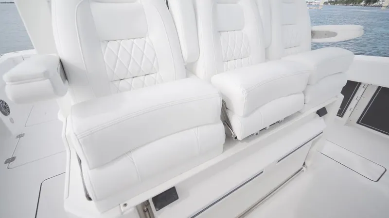 Slide: The Image of Luxurious white seating on 2026 World Cat 400CC-X boat. - 39