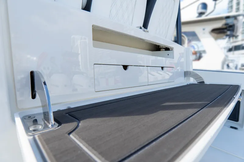 Slide: The Image of 2026 World Cat 400CC-X boat interior with sleek storage compartments and modern design. - 20