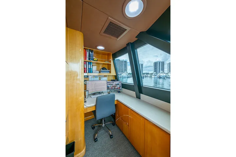 Slide: The Image of Luxurious office space on 1997 Delta Marine Tri-deck Motoryacht with marina view. - 30