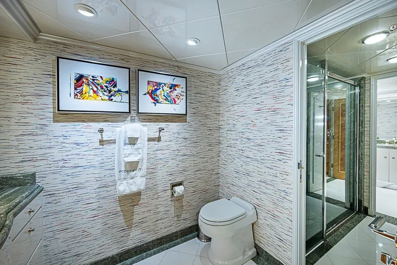 Slide: The Image of Luxurious bathroom on 1997 Delta Marine Tri-deck Motoryacht with modern decor and glass shower. - 37