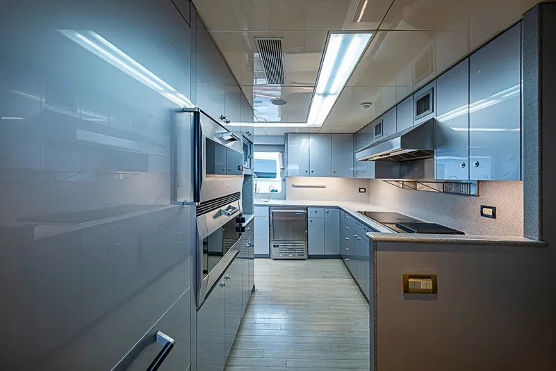 Slide: The Image of Luxurious kitchen interior of 1997 Delta Marine Tri-deck Motoryacht with modern appliances. - 2