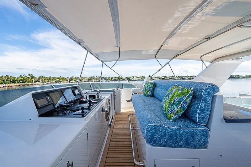 Slide: The Image of Luxurious 1997 Delta Marine Tri-deck Motoryacht with spacious deck and plush seating. - 79