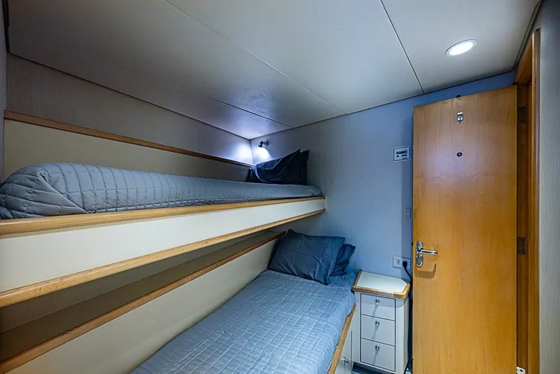 Slide: The Image of Cozy cabin with bunk beds on 1997 Delta Marine Tri-deck Motoryacht. - 54