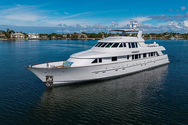 Slide: The Image of Luxurious 1997 Delta Marine Tri-deck Motoryacht cruising on serene waters. - 90