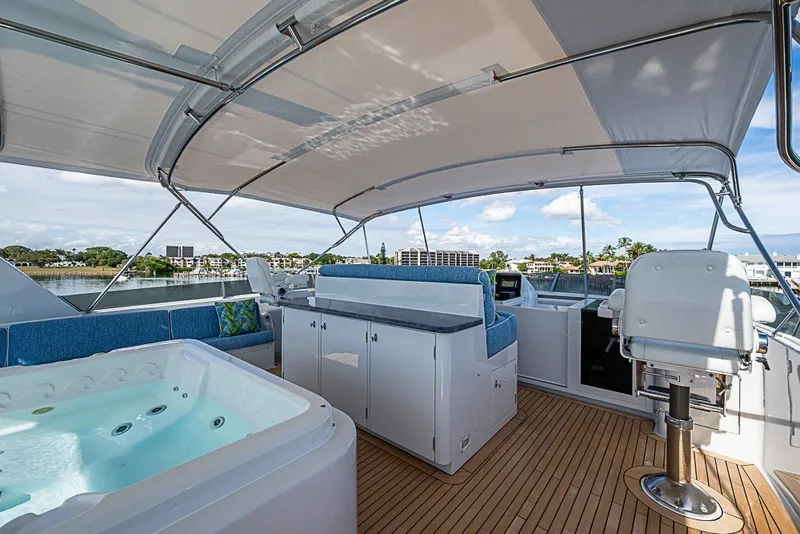 Slide: The Image of Luxurious 1997 Delta Marine Tri-deck Motoryacht with jacuzzi and spacious deck seating. - 74