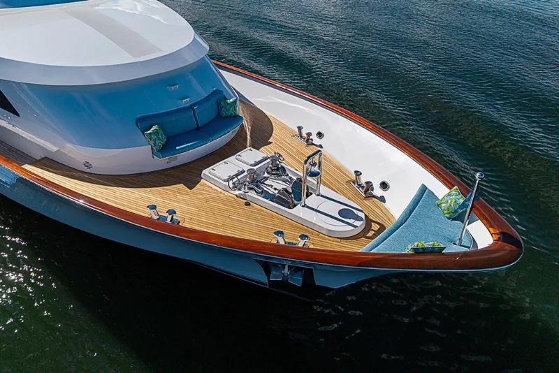 Slide: The Image of Luxurious 1997 Delta Marine Tri-deck Motoryacht with elegant teak deck and plush seating. - 96