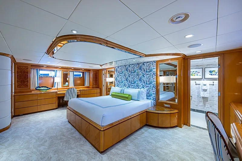 Slide: The Image of Luxurious bedroom interior of 1997 Delta Marine Tri-deck Motoryacht with elegant wood finishes. - 33