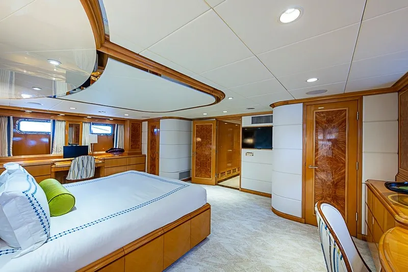 Slide: The Image of Luxurious bedroom interior of 1997 Delta Marine Tri-deck Motoryacht with elegant wood finishes. - 34