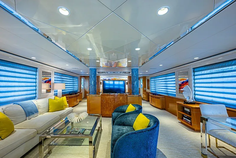 Slide: The Image of Luxurious interior of 1997 Delta Marine Tri-deck Motoryacht with modern furnishings and vibrant decor. - 7