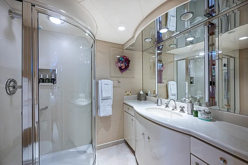 Slide: The Image of Luxurious bathroom on 1997 Delta Marine Tri-deck Motoryacht with modern fixtures and glass shower. - 46