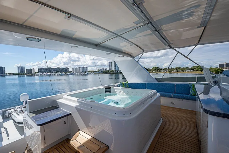 Slide: The Image of Luxurious 1997 Delta Marine Tri-deck Motoryacht with jacuzzi and scenic waterfront view. - 81