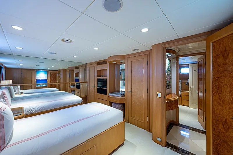 Slide: The Image of Luxurious bedroom interior of 1997 Delta Marine Tri-deck Motoryacht with twin beds and elegant wood finishes. - 45