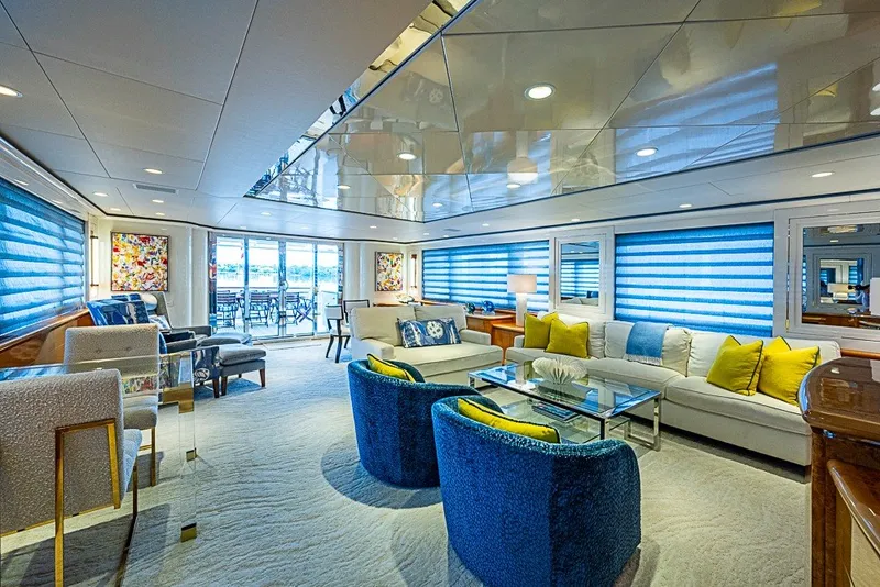 Slide: The Image of Luxurious interior of 1997 Delta Marine Tri-deck Motoryacht with elegant seating and vibrant decor. - 1