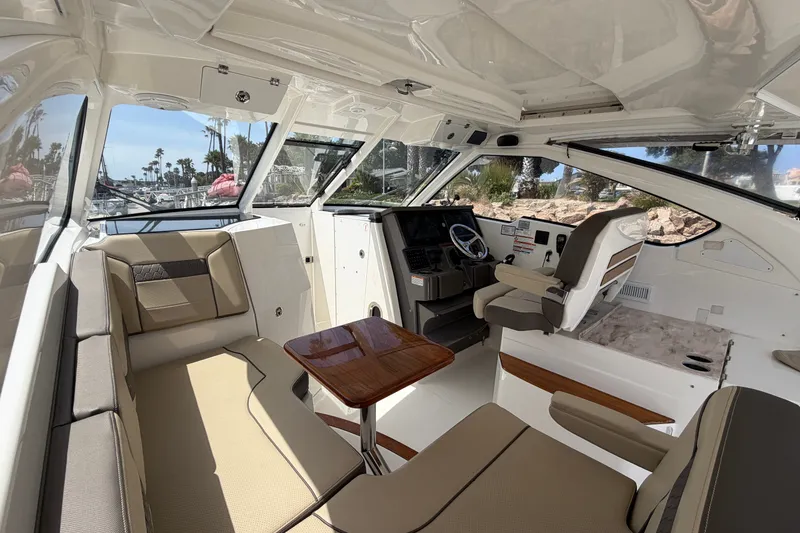 Slide: The Image of Interior of 2019 Pursuit DC 365 Dual Console boat with seating and helm station. - 25