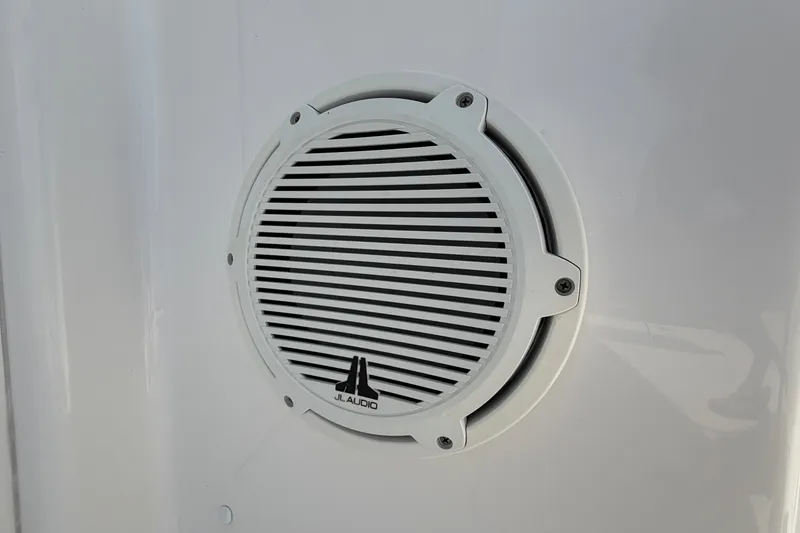 Slide: The Image of JL Audio speaker on 2019 Pursuit DC 365 Dual Console boat. - 75