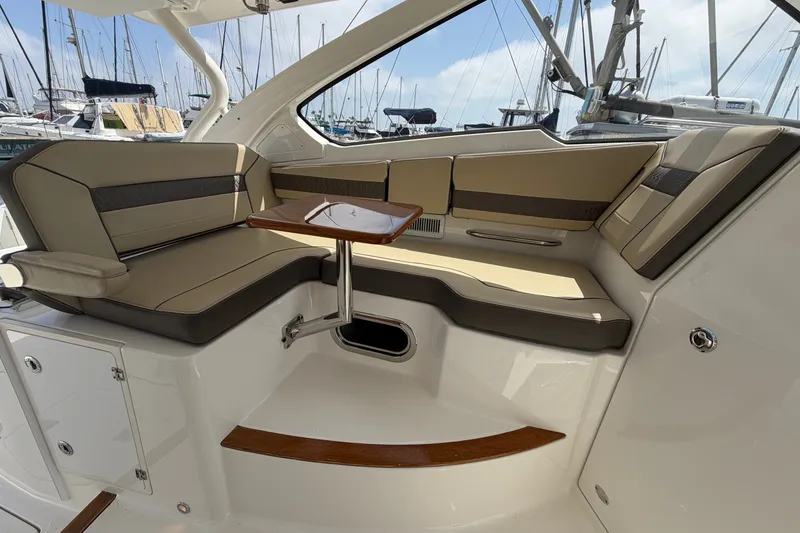 Slide: The Image of Luxurious seating area on a 2019 Pursuit DC 365 Dual Console boat. - 40