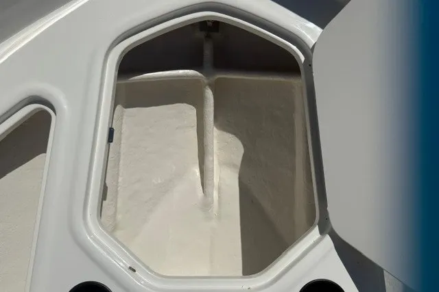 Slide: The Image of Storage compartment of 2027 Bayliner Element E16 boat, open and empty. - 21