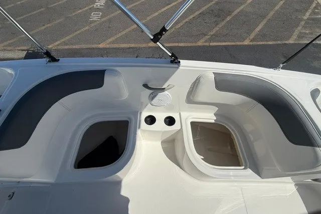 Slide: The Image of 2027 Bayliner Element E16 boat interior with seating and storage compartments. - 9