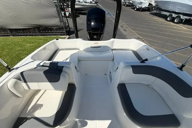 Slide: The Image of 2027 Bayliner Element E16 boat interior with spacious seating and modern design. - 7