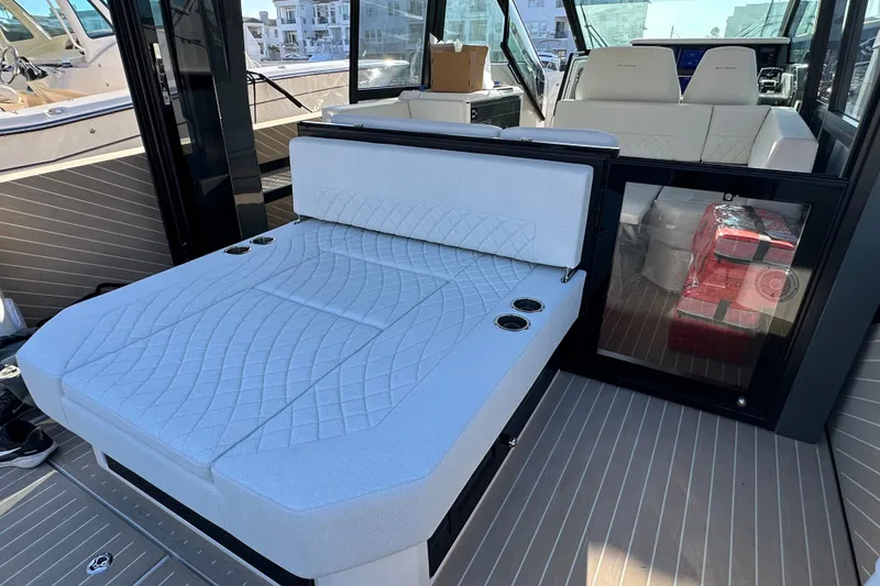 Slide: The Image of Luxurious interior of 2027 Saxdor 400 GTC boat with plush seating and modern design. - 35