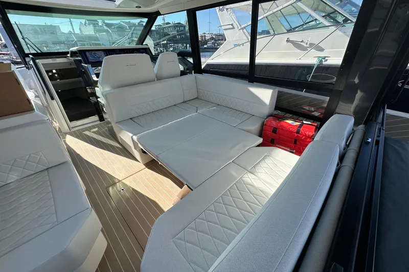 Slide: The Image of Luxurious interior of 2027 Saxdor 400 GTC yacht with elegant seating and modern design. - 19
