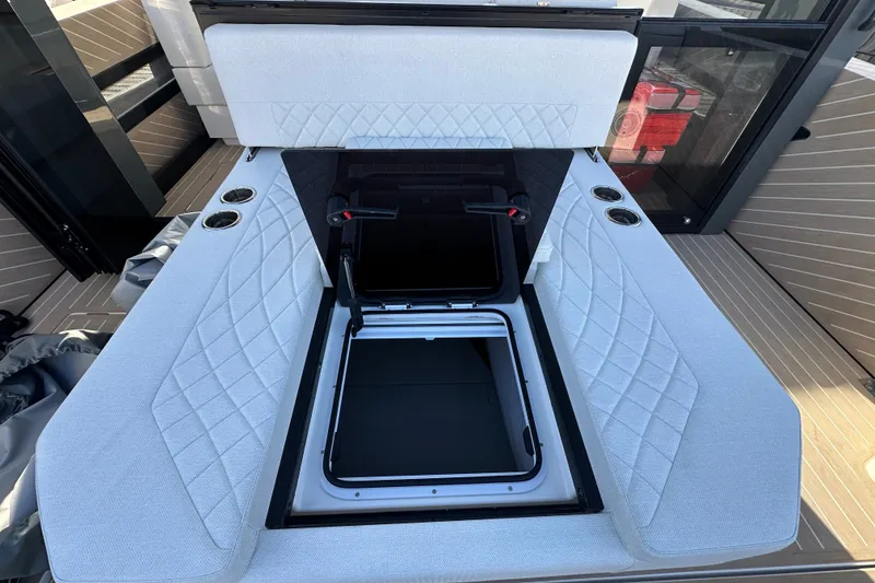Slide: The Image of Luxurious interior of 2027 Saxdor 400 GTC boat with quilted seating and storage compartment. - 33