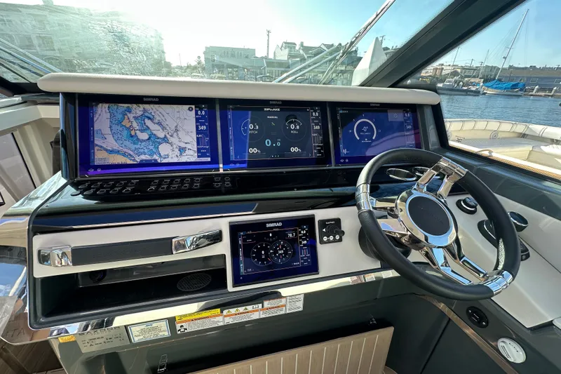Slide: The Image of Helm of 2027 Saxdor 400 GTC with advanced navigation displays and sleek steering wheel. - 20