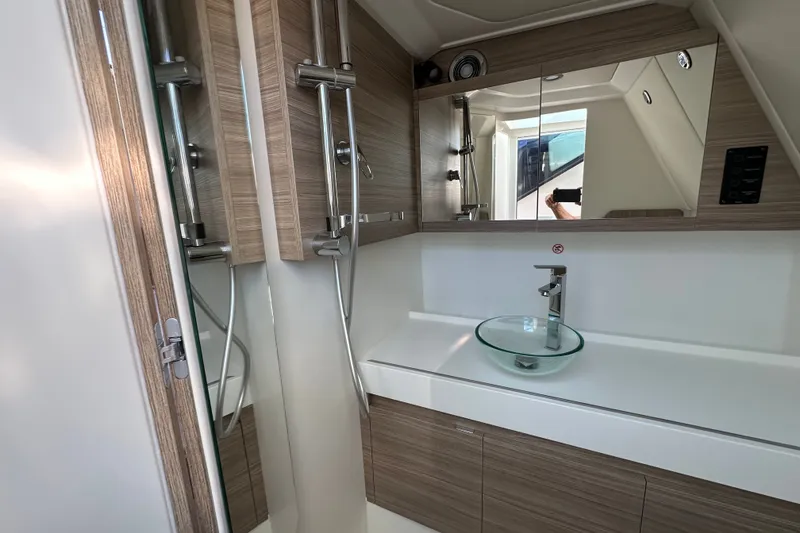 Slide: The Image of Modern bathroom interior of 2027 Saxdor 400 GTC yacht with sleek fixtures and glass sink. - 29