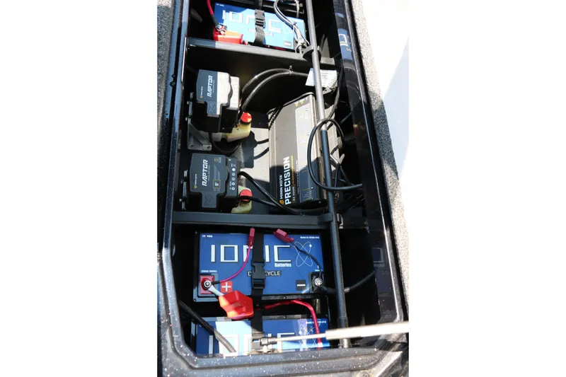 Slide: The Image of Battery compartment of 2022 Vexus VX21 boat with Ionic lithium batteries and Precision charger. - 89