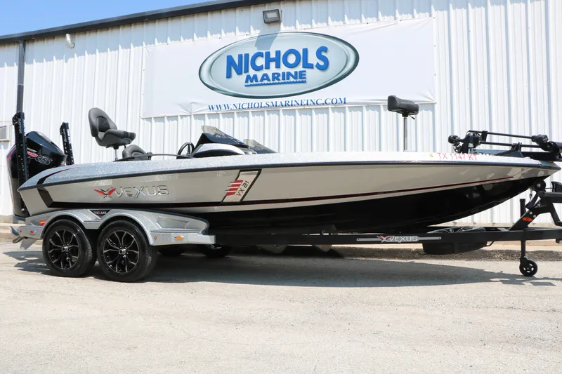The Image of 2022 Vexus VX21 boat at Nichols Marine dealership, featuring sleek design and modern features. - 1