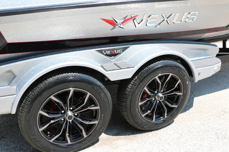Slide: The Image of 2022 Vexus VX21 boat trailer with stylish black alloy wheels and sleek design. - 27