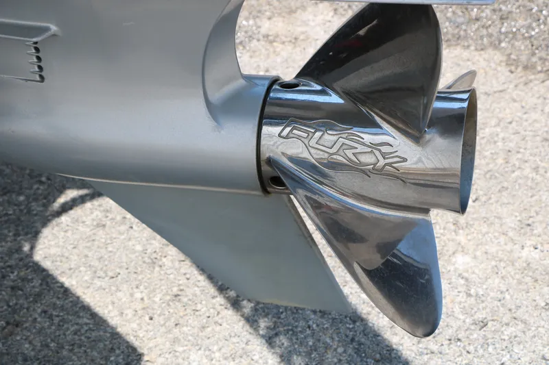 Slide: The Image of Close-up of a 2022 Vexus VX21 boat propeller with "Fury" branding. - 26