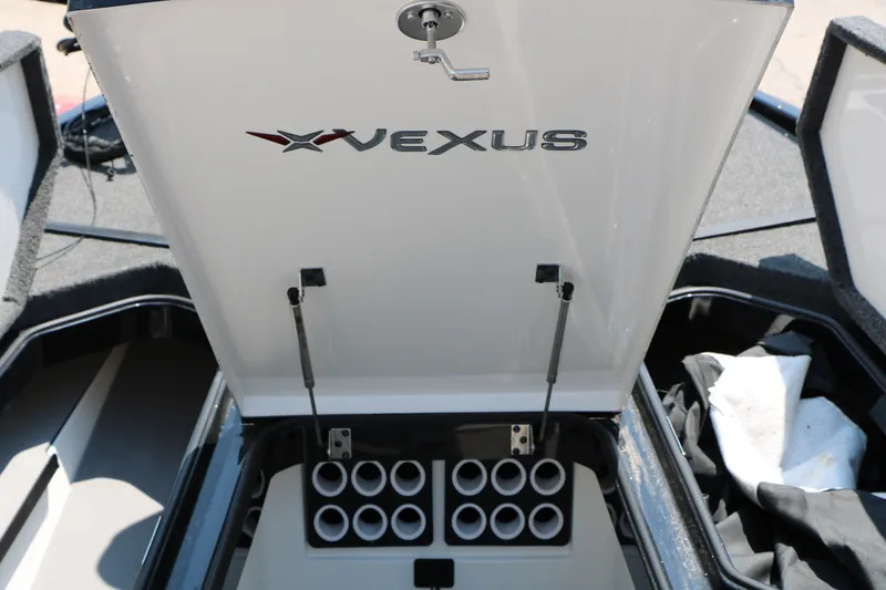 Slide: The Image of Open storage compartment of 2022 Vexus VX21 boat, showcasing organized interior layout. - 72