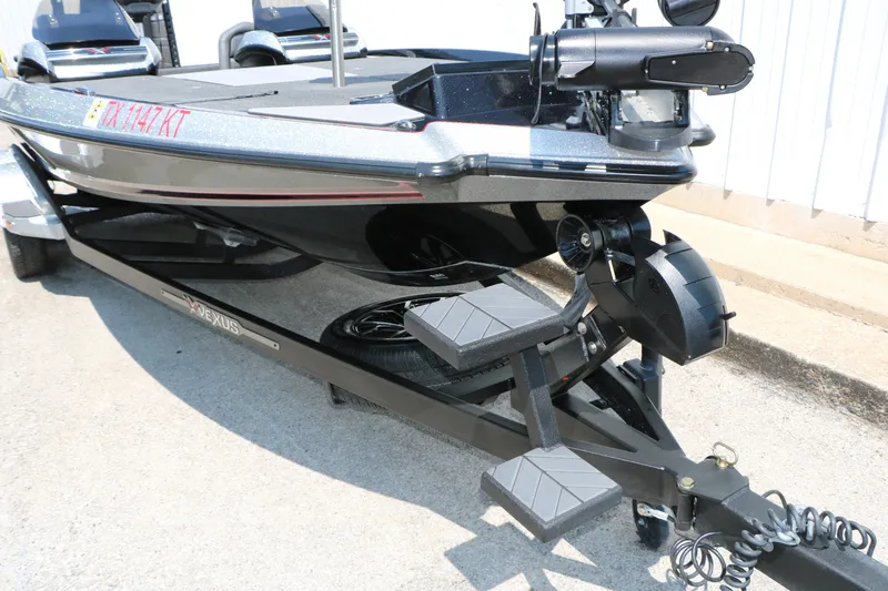 Slide: The Image of 2022 Vexus VX21 boat on trailer, featuring sleek design and modern equipment. - 37