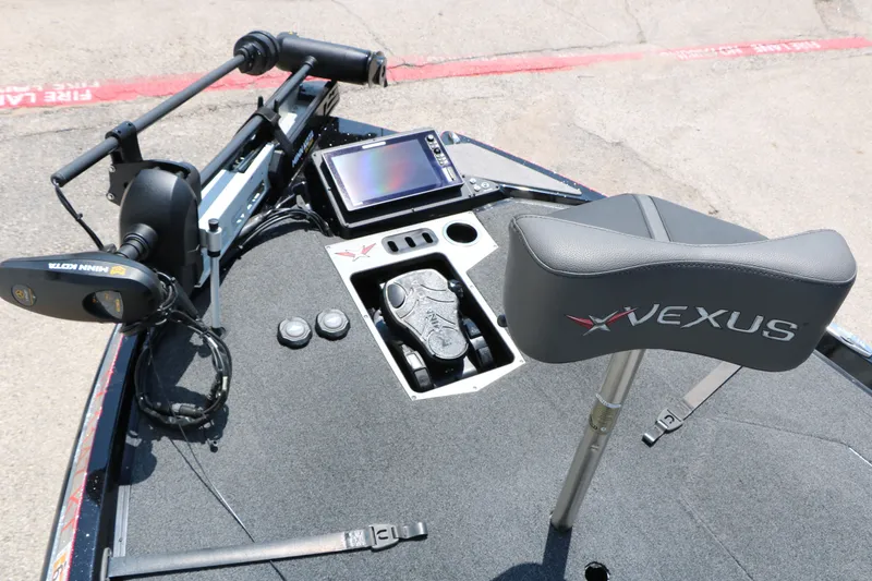 Slide: The Image of 2022 Vexus VX21 boat deck with Minn Kota trolling motor and control panel. - 35