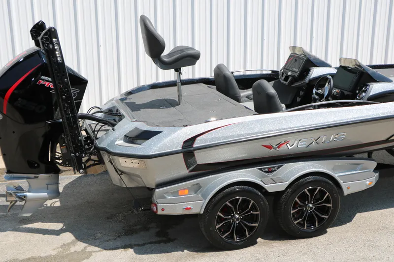 Slide: The Image of 2022 Vexus VX21 boat with dual console and powerful outboard motor. - 31