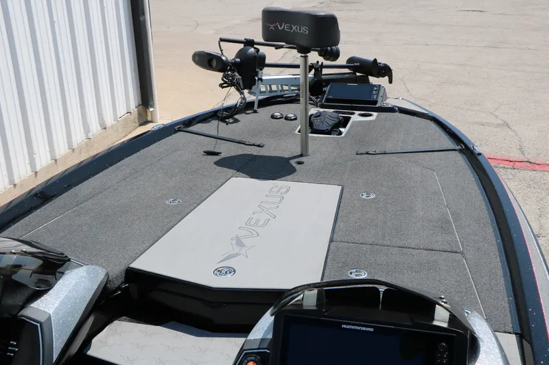 Slide: The Image of 2022 Vexus VX21 boat deck with advanced fishing equipment and controls. - 34