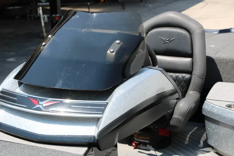 Slide: The Image of 2022 Vexus VX21 boat cockpit with windshield and cushioned seat. - 43