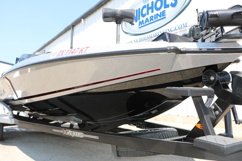 Slide: The Image of 2022 Vexus VX21 boat on trailer at Nichols Marine dealership. - 3