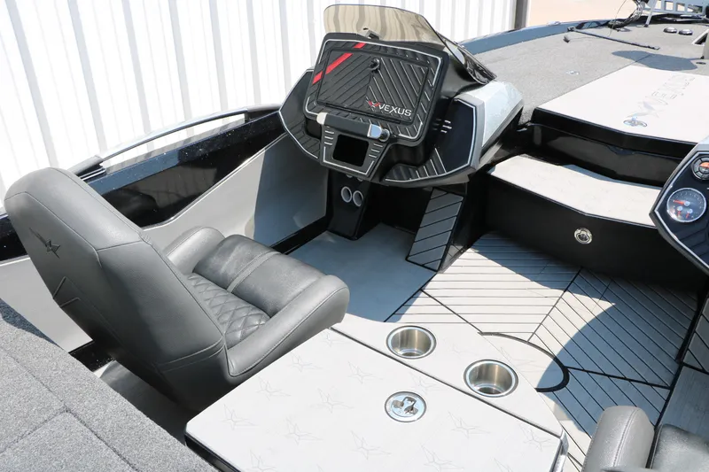 Slide: The Image of 2022 Vexus VX21 boat interior with modern dashboard and seating. - 93