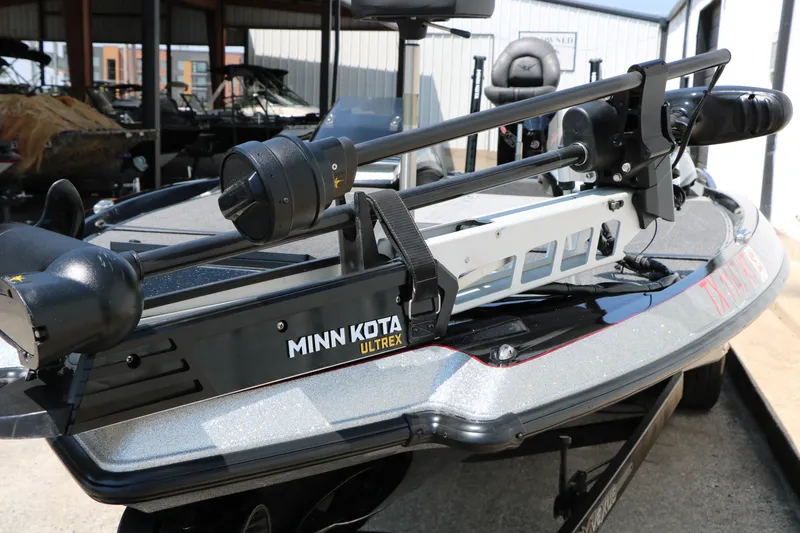 Slide: The Image of 2022 Vexus VX21 boat with Minn Kota Ultrex trolling motor in a showroom. - 38