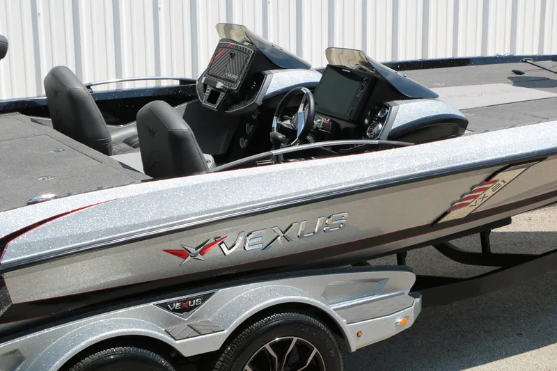 Slide: The Image of 2022 Vexus VX21 boat interior with sleek design and advanced dashboard features. - 32