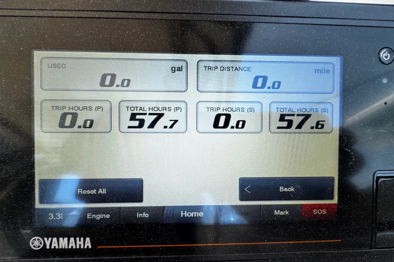 Slide: The Image of Yamaha engine display showing trip and total hours for Grady-White Freedom 285, 2022 model. - 35