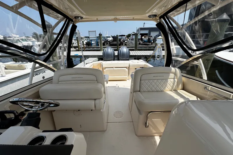 Slide: The Image of 2022 Grady-White Freedom 285 boat interior with luxurious seating and modern design. - 17