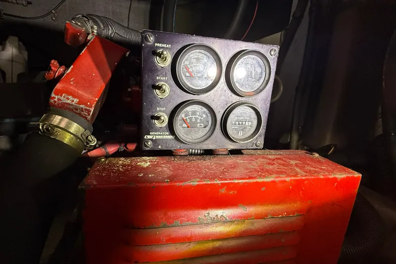 Slide: The Image of Control panel of a 1990 Sea Ray 420 Sundancer boat engine room. - 32