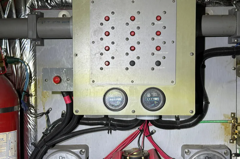 Slide: The Image of Control panel of a 1990 Sea Ray 420 Sundancer boat engine room. - 13